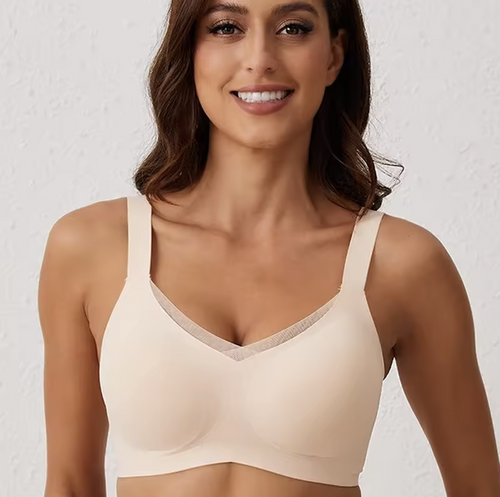 Beige convertible crossover bra by On The Rack with smooth satin finish, adjustable straps, padded cups, and seamless design