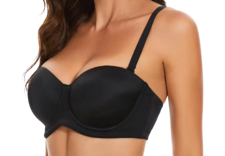 Close-up of moisture-wicking stretch mesh fabric with subtle stitching details on the EVENT Bra's back strap.