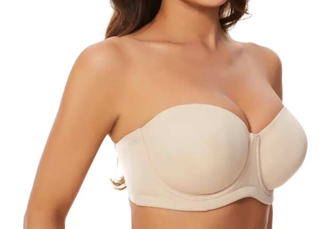 Close-up of the black elastic band with "The EVENT Bra" logo printed in white, highlighting the textured stretch material.