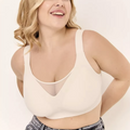 On The Rack CoverMe Bra beige with satin-finish nylon fabric, seamless design, and adjustable shoulder straps